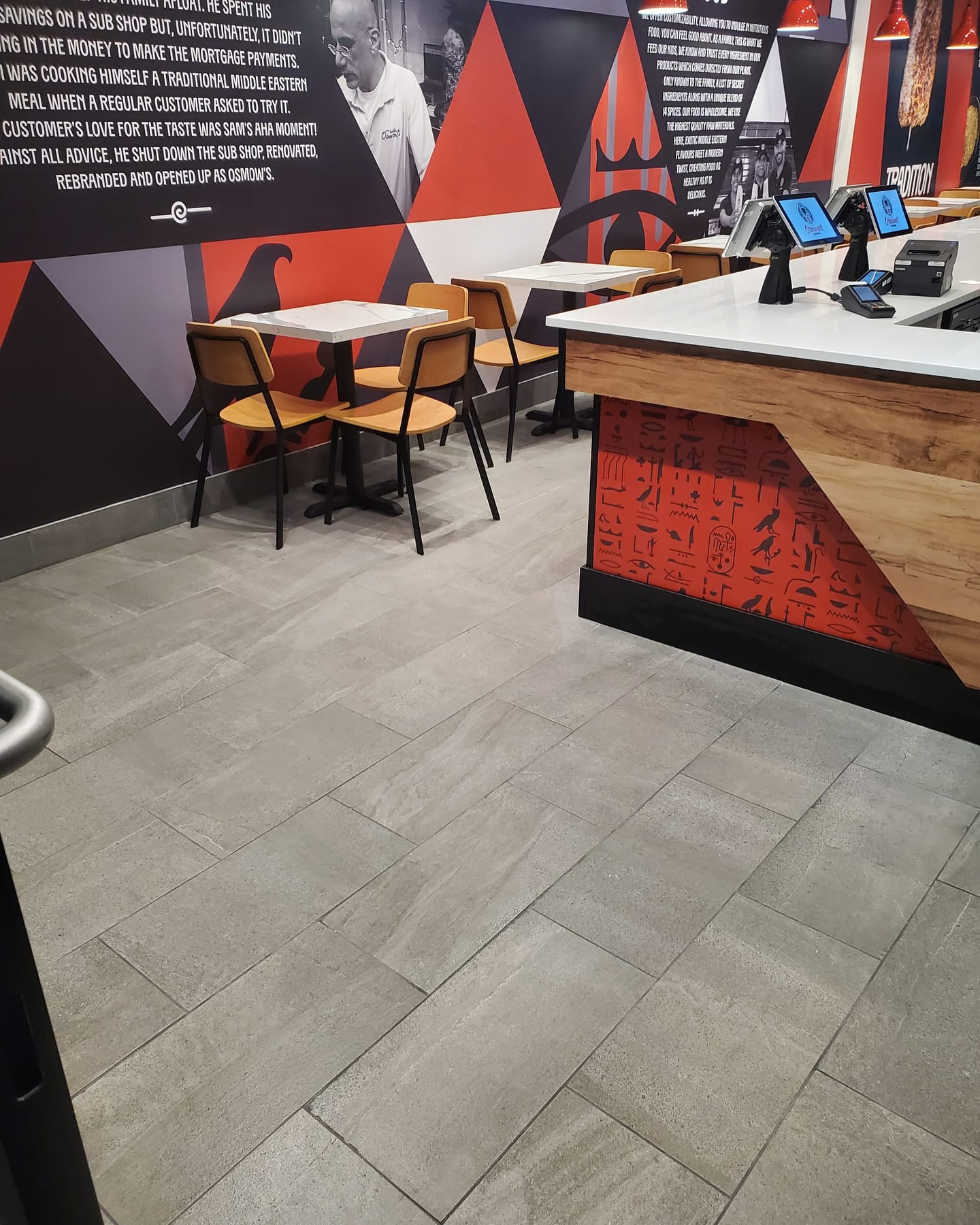 A friendly New Generation Cleaners team member in a commercial space.